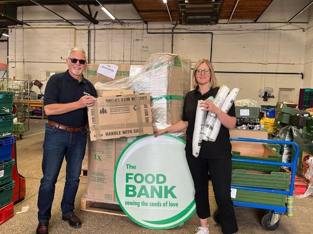 Donating vital supplies to MK Food Bank